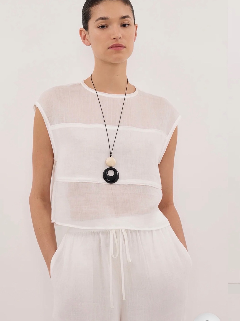 DISSH NWOT black Kai Ramie sheer paneled top